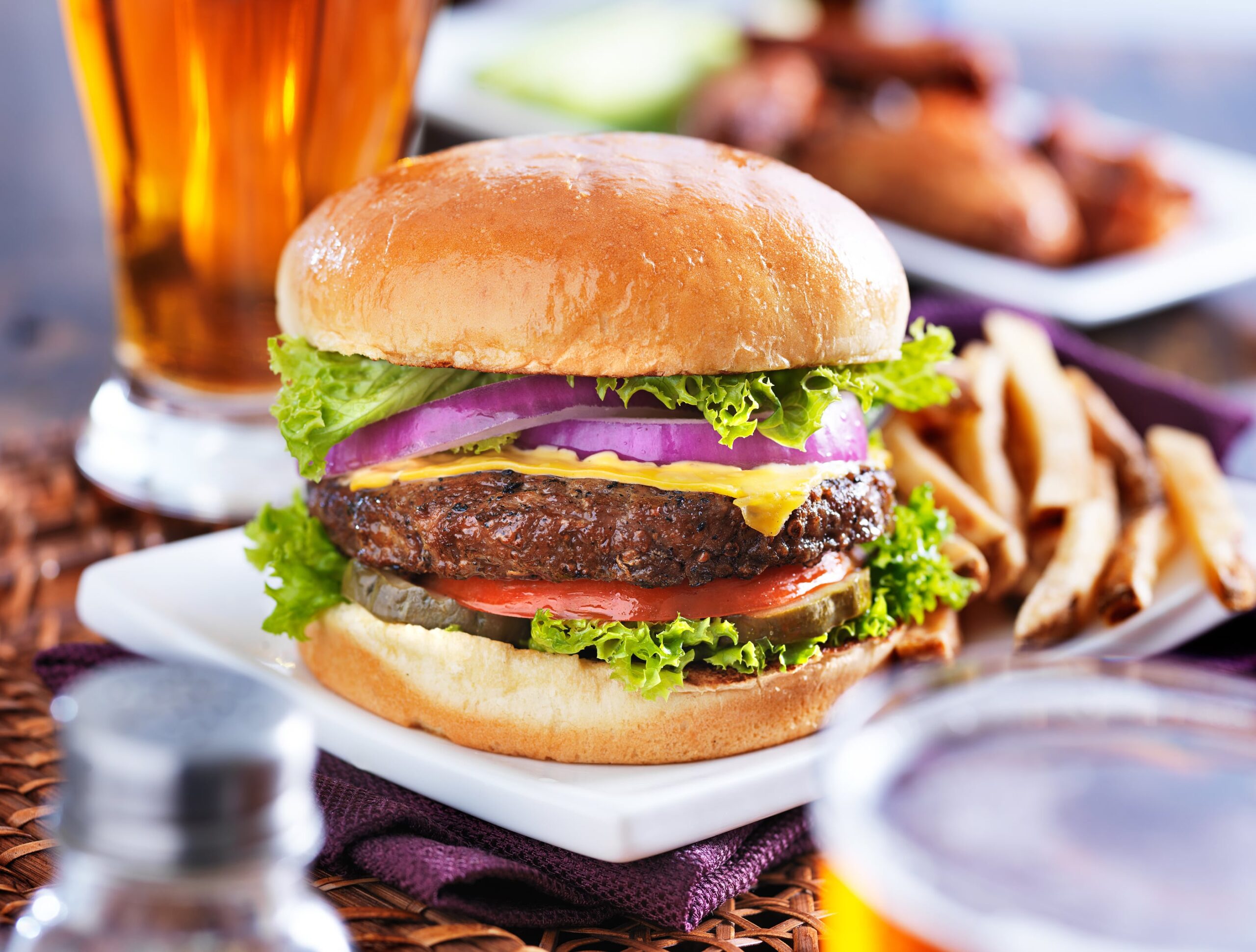 Large burger with beer